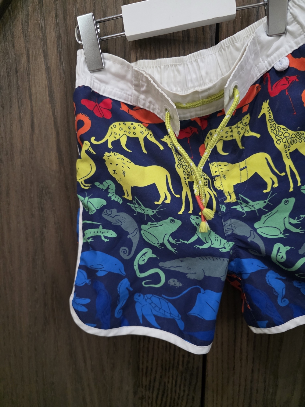 Mini Boden Navy Swim Trunks with Multicolor Animal Print - Picture 3 of 4